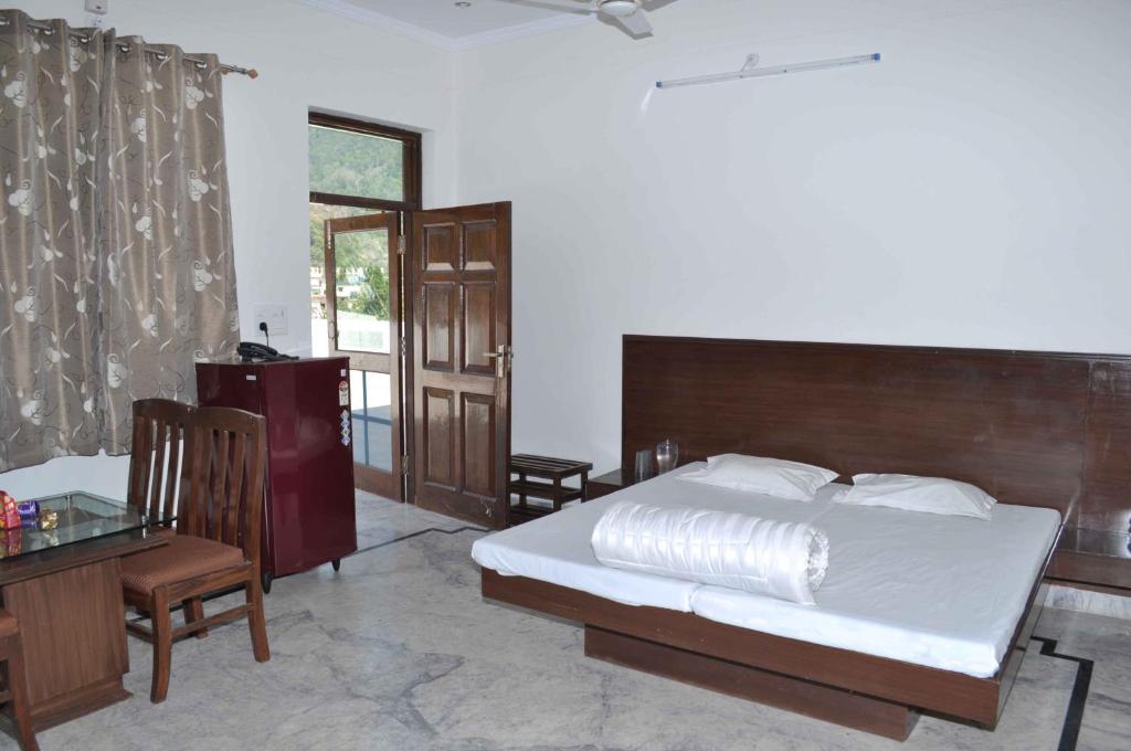 Shivanta Residency Hotell Rishīkesh Rum bild